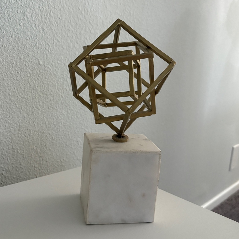 Geometric Gold Sculpture on Marble Base